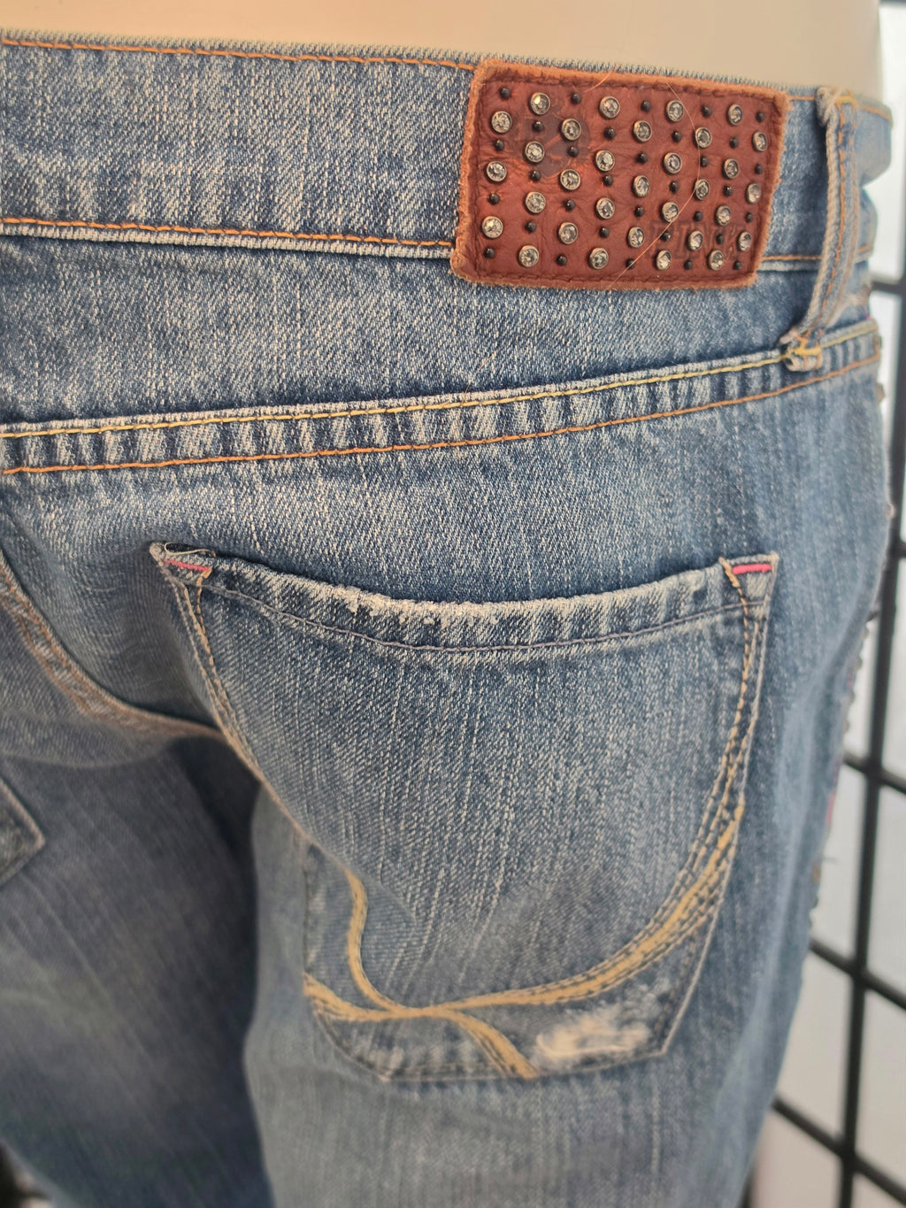 Rebelliously Distressed Denim Jeans