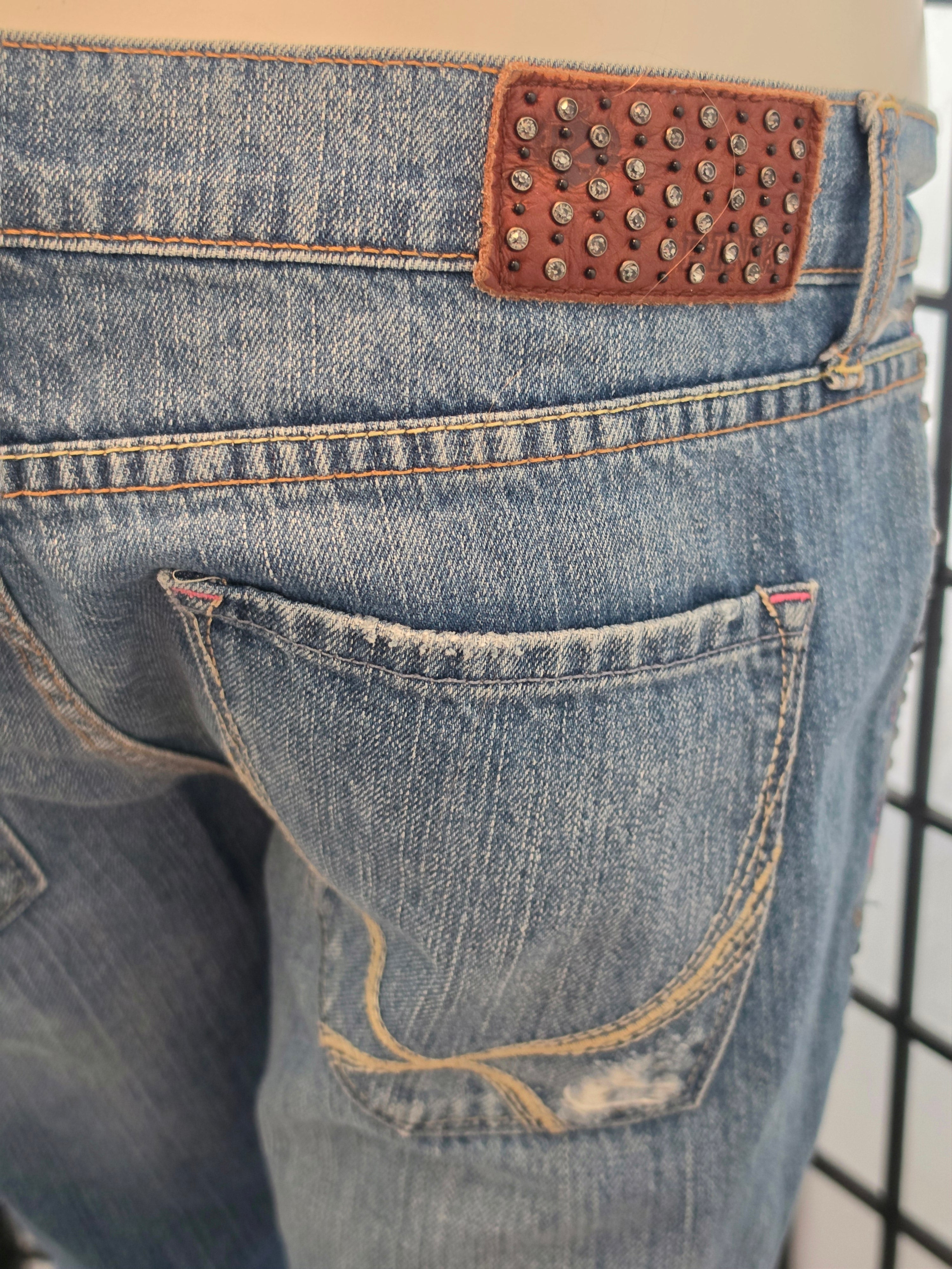 Rebelliously Distressed Denim Jeans