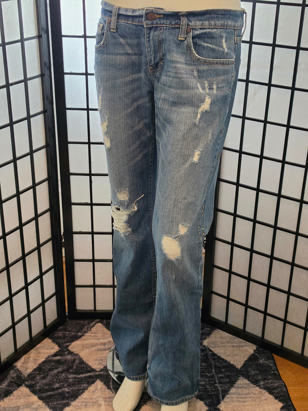 Rebelliously Distressed Denim Jeans