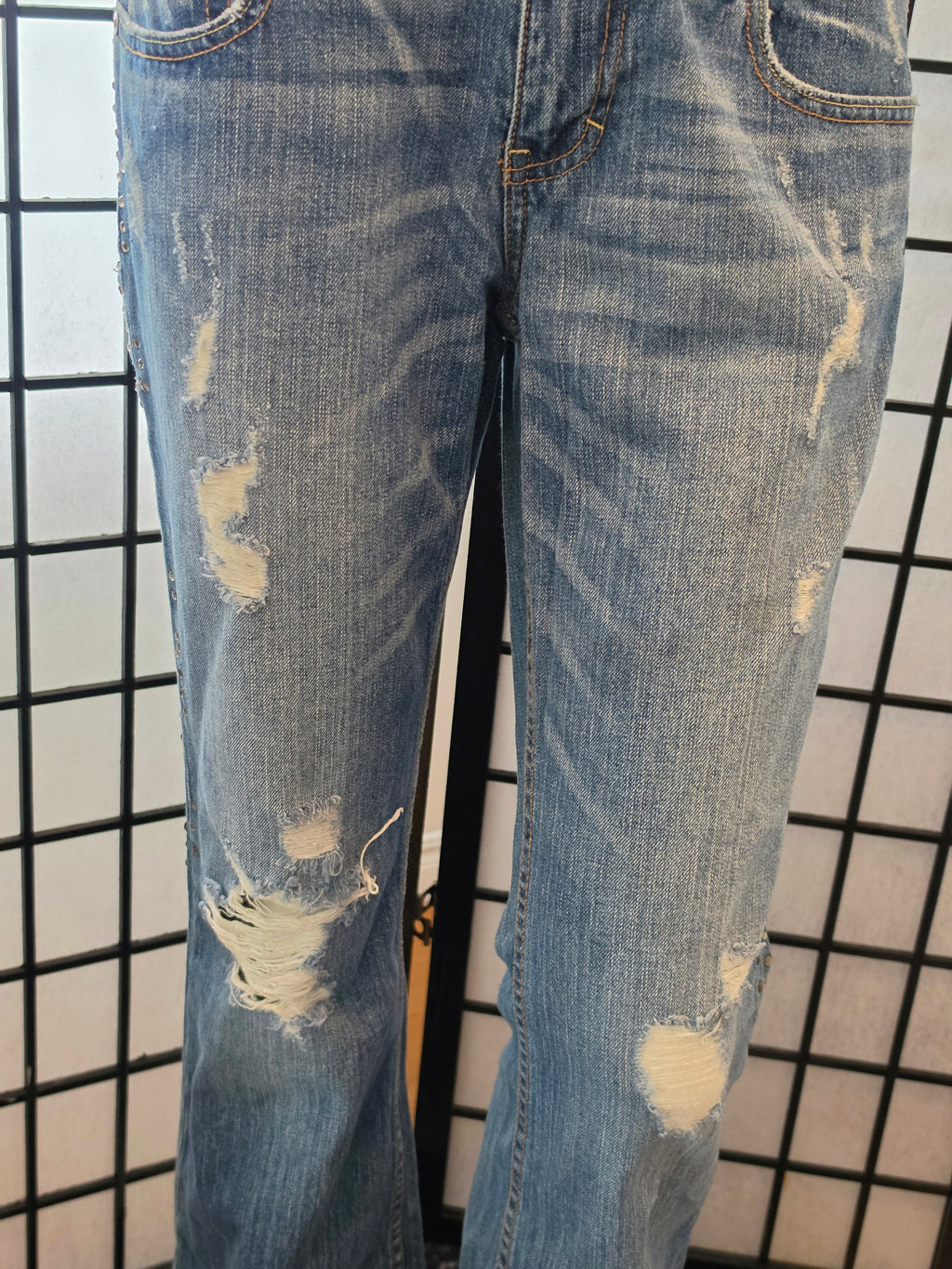 Rebelliously Distressed Denim Jeans