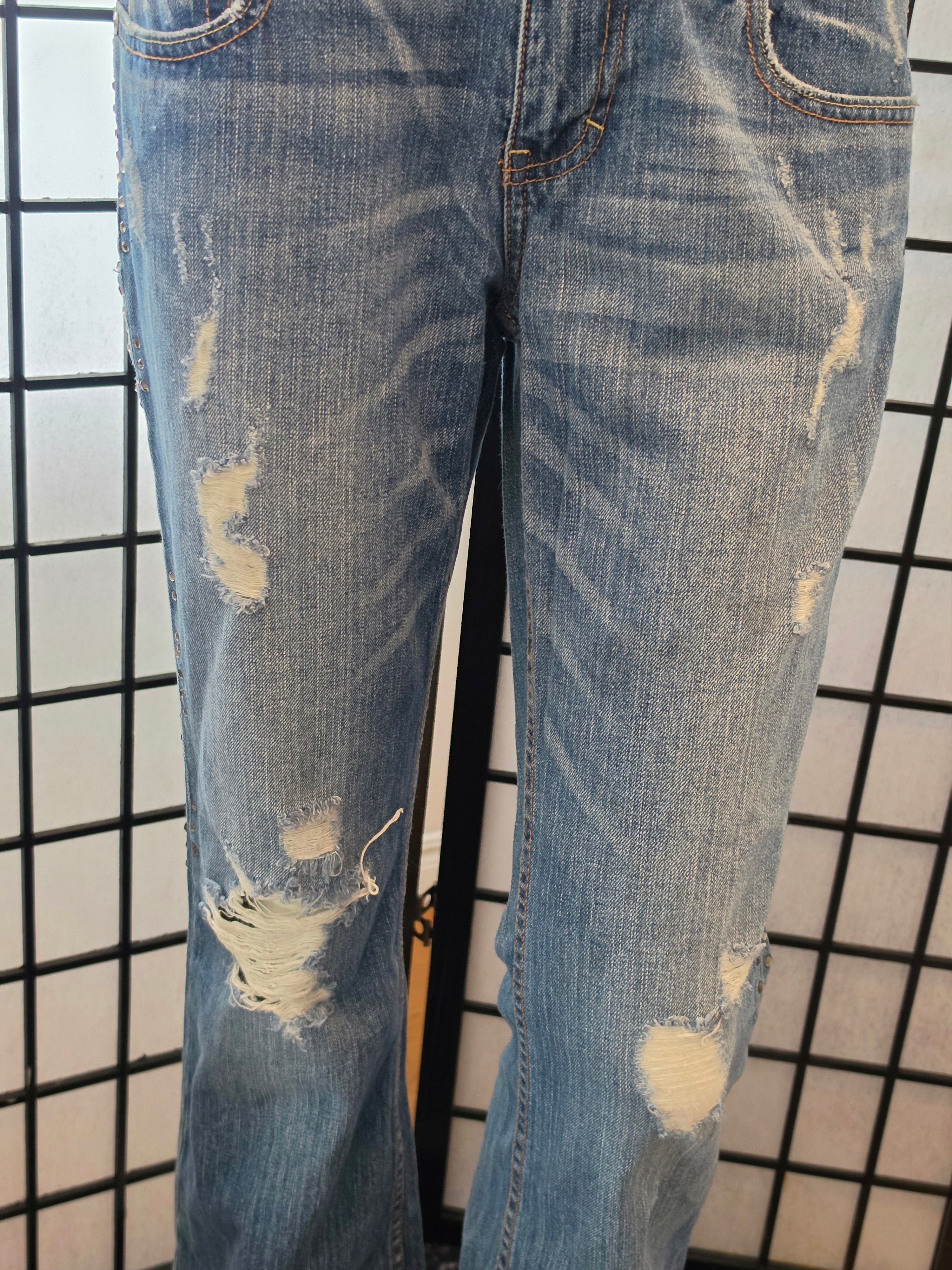 Rebelliously Distressed Denim Jeans