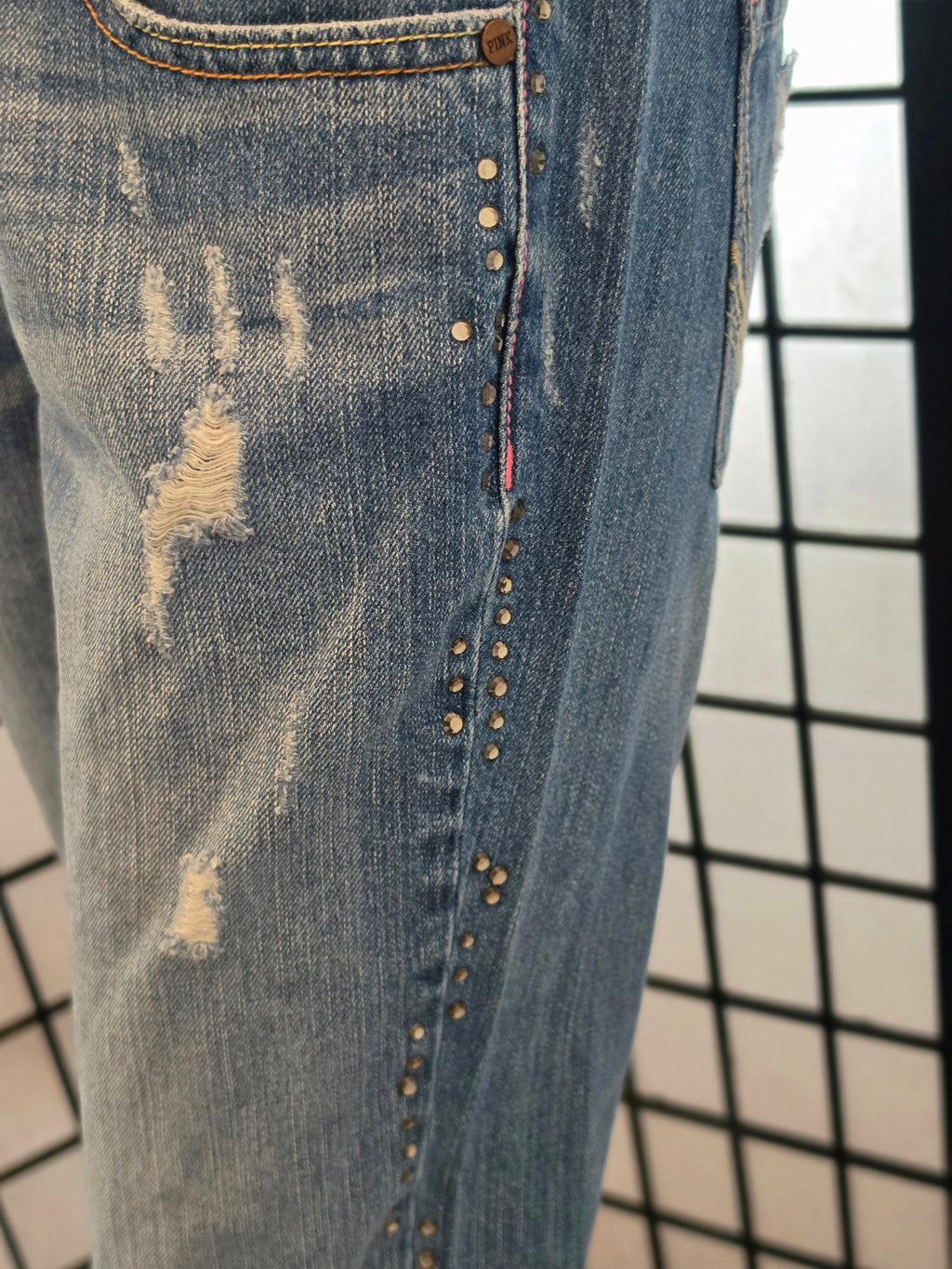 Rebelliously Distressed Denim Jeans