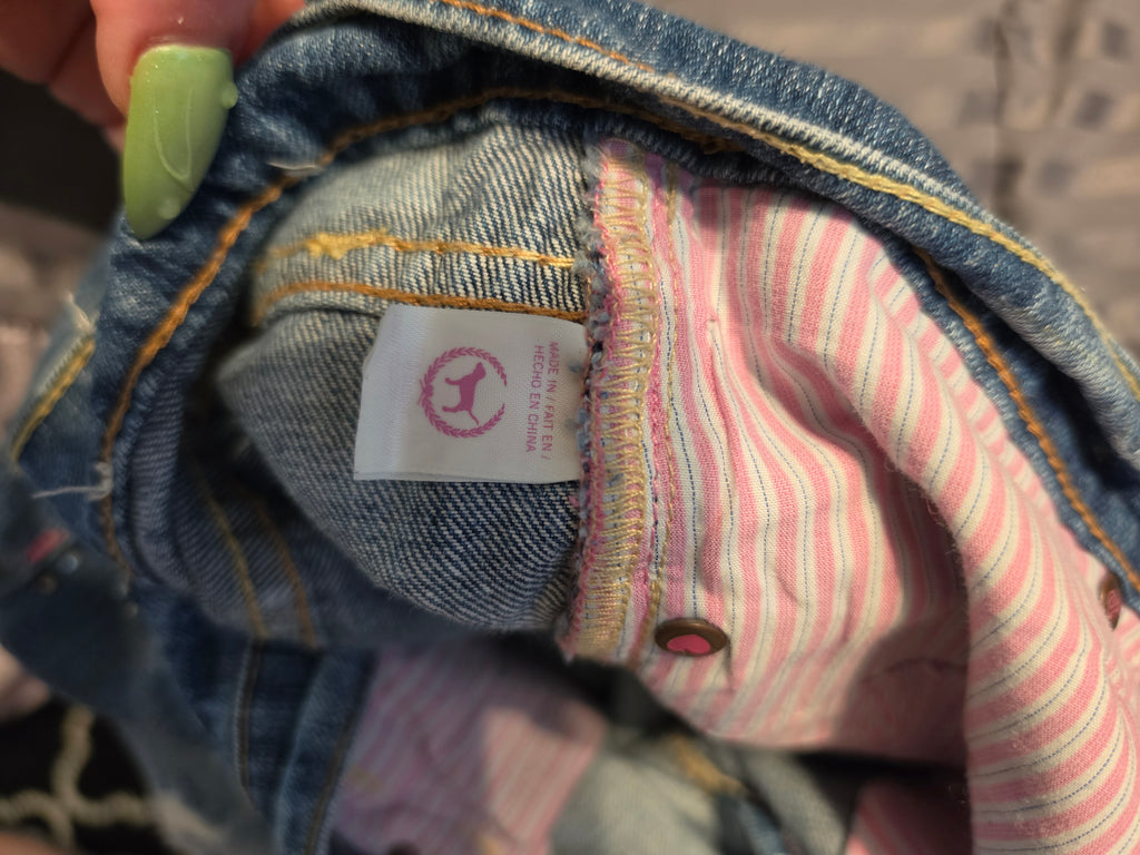 Rebelliously Distressed Denim Jeans