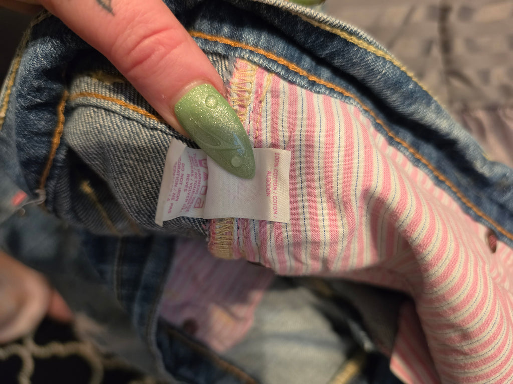 Rebelliously Distressed Denim Jeans