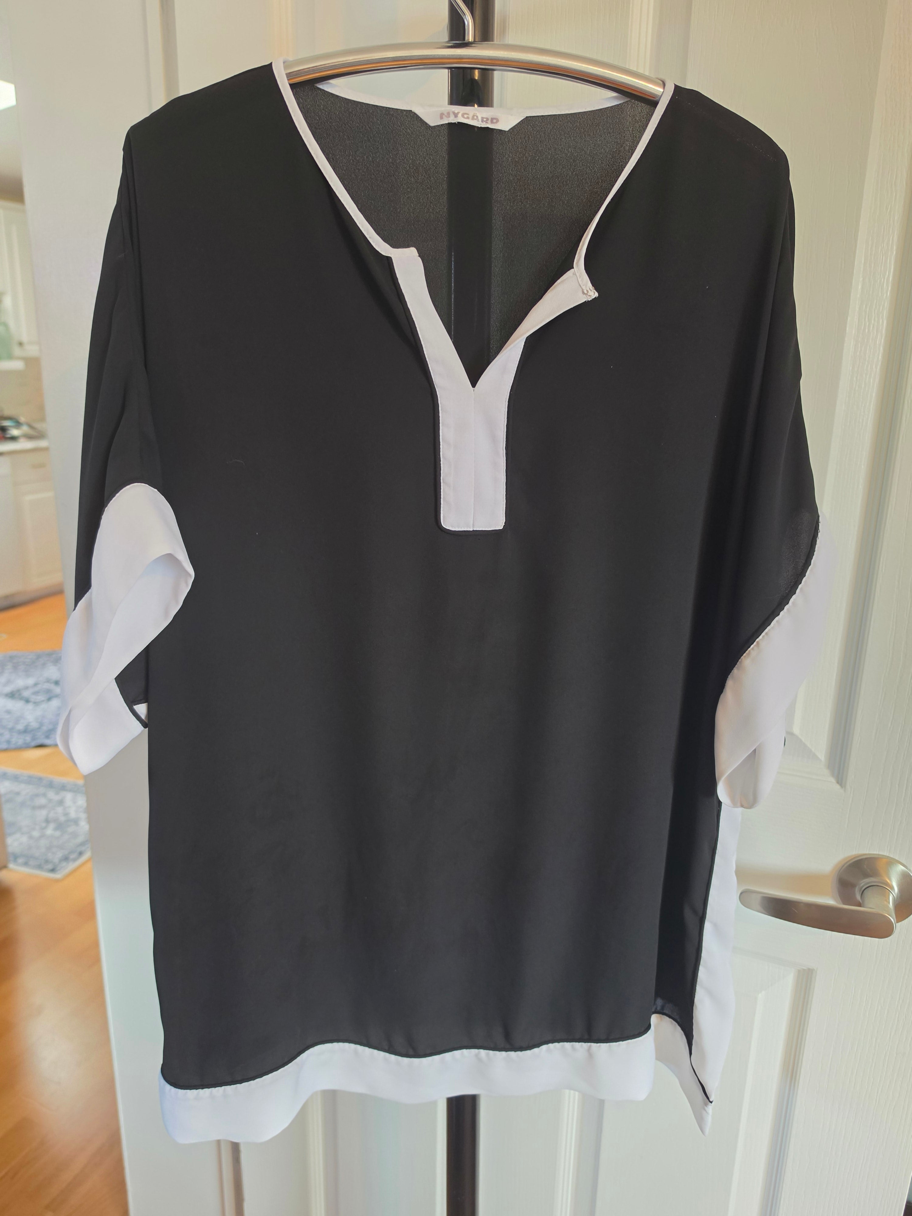 Monochrome Moment — Nygård Black & White Colour-Block Blouse