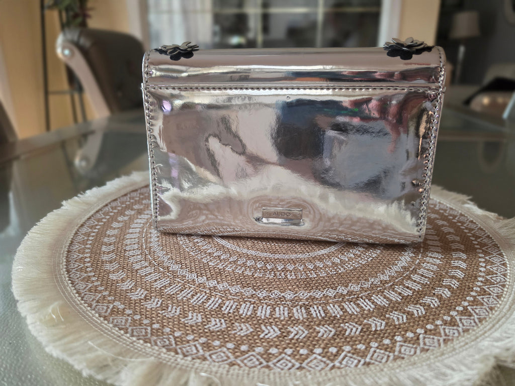 ALDO silver metallic clutch — back with logo plate