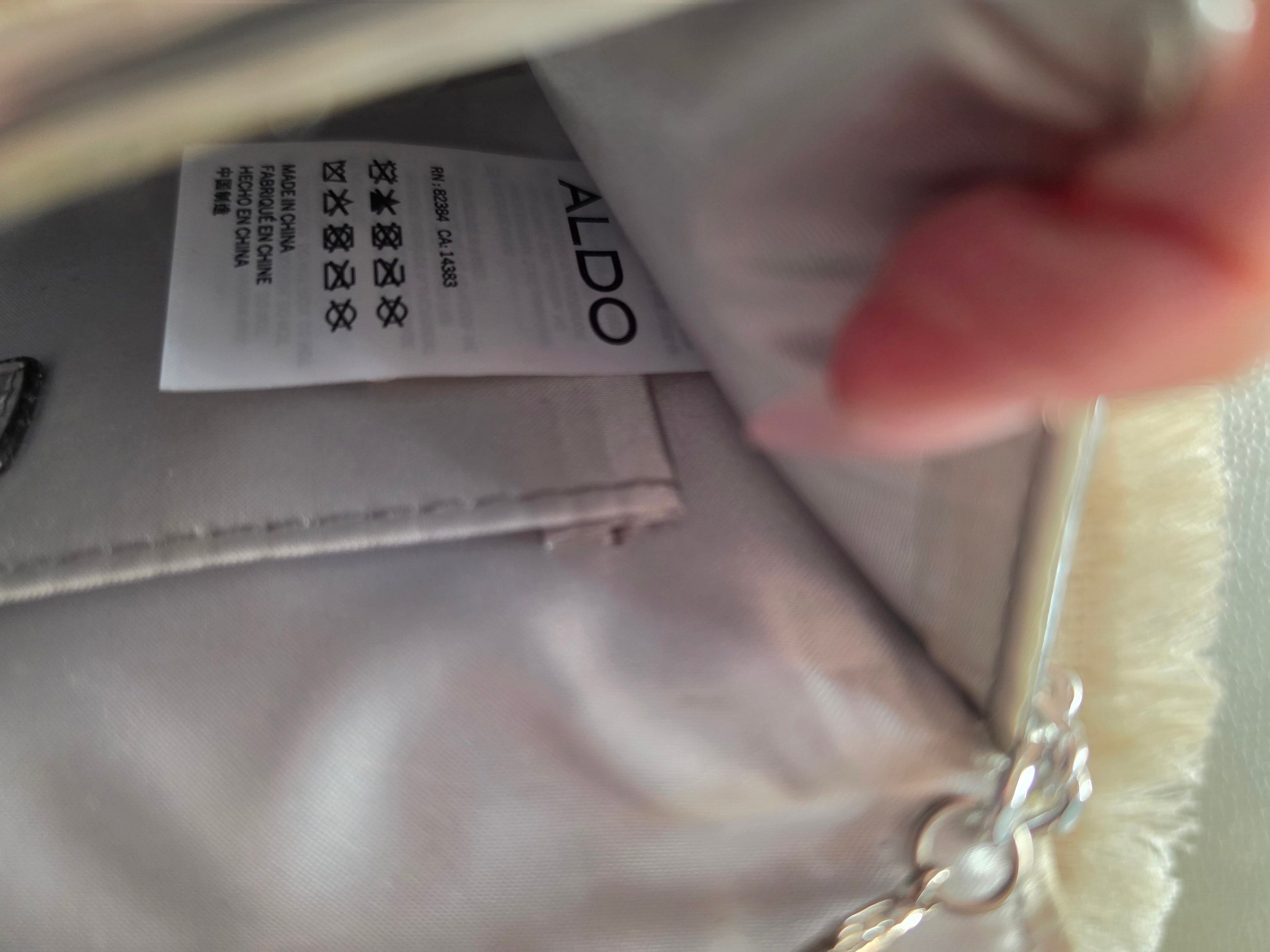 ALDO brand label and care tag