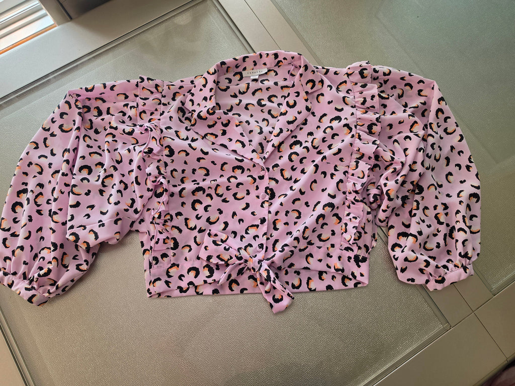 Pink leopard print blouse - neckline and ruffle detail