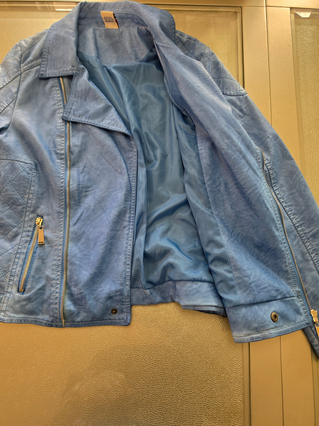 The Sky Rider — Quilted Faux Leather Moto Jacket in Periwinkle Blue