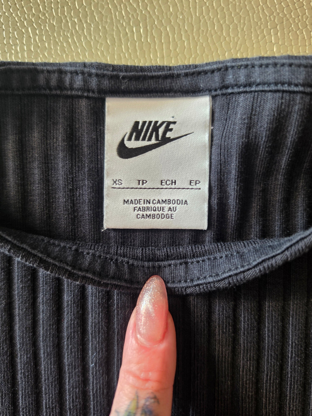 Nike Ribbed Crop Tee — brand tag