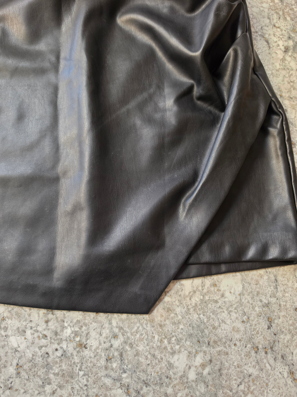 Asymmetric overlapping hem detail