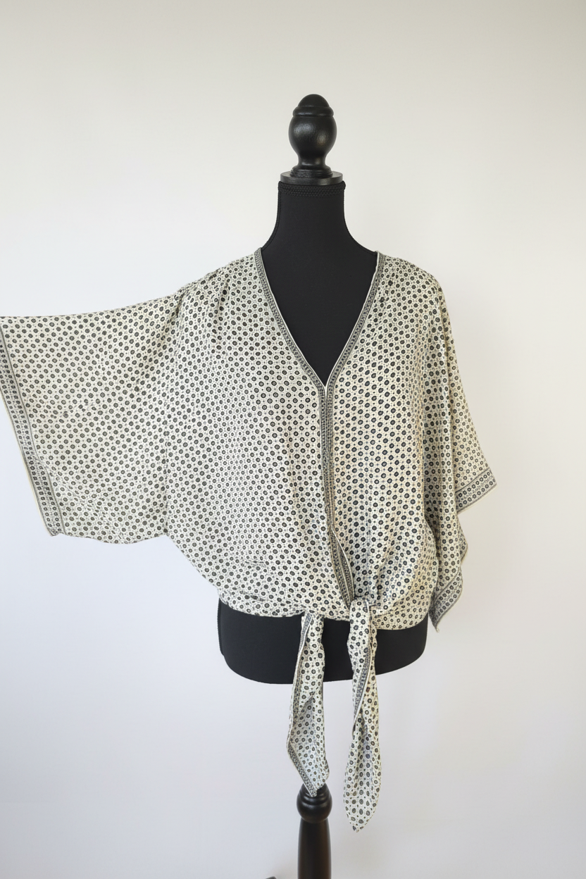 The Orbit Wrap Top – Max Studio on mannequin, white background
