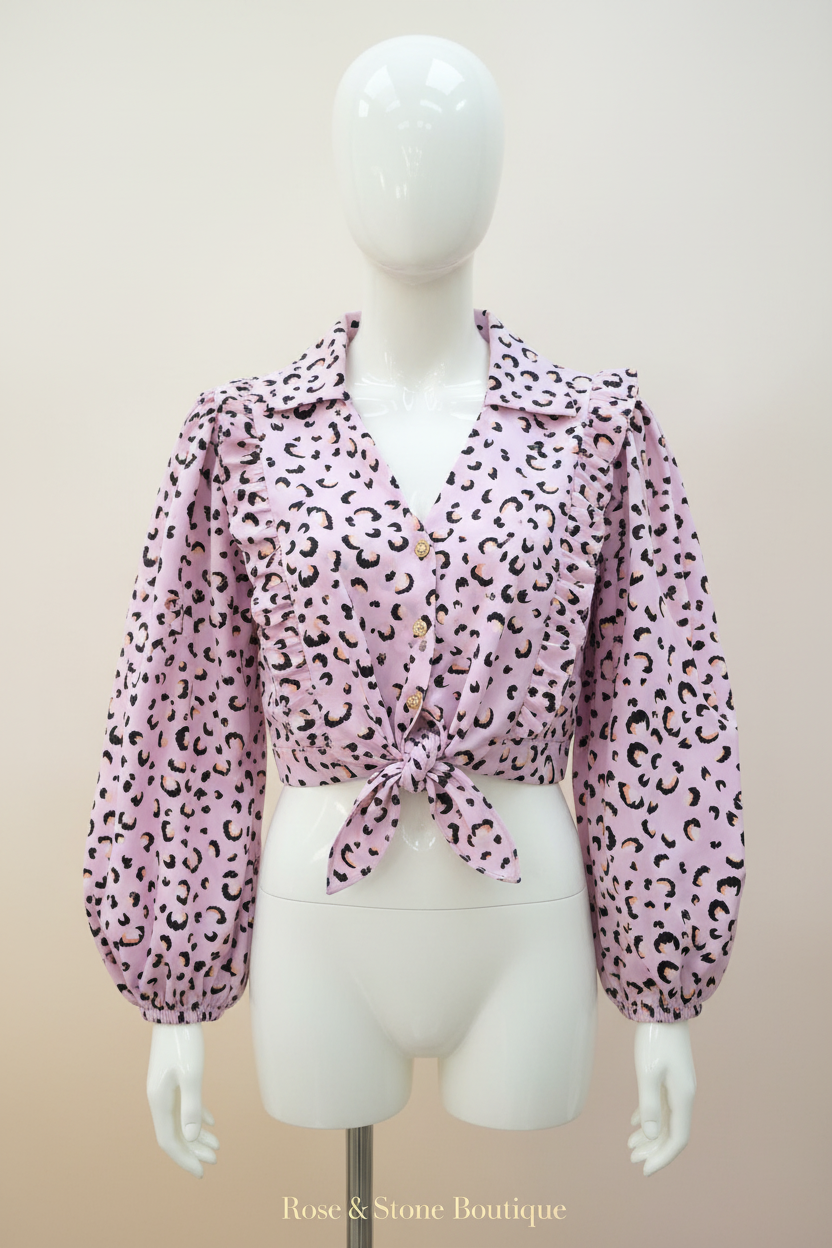 Clean mannequin portrait of The Wild Bloom Blouse on soft neutral background