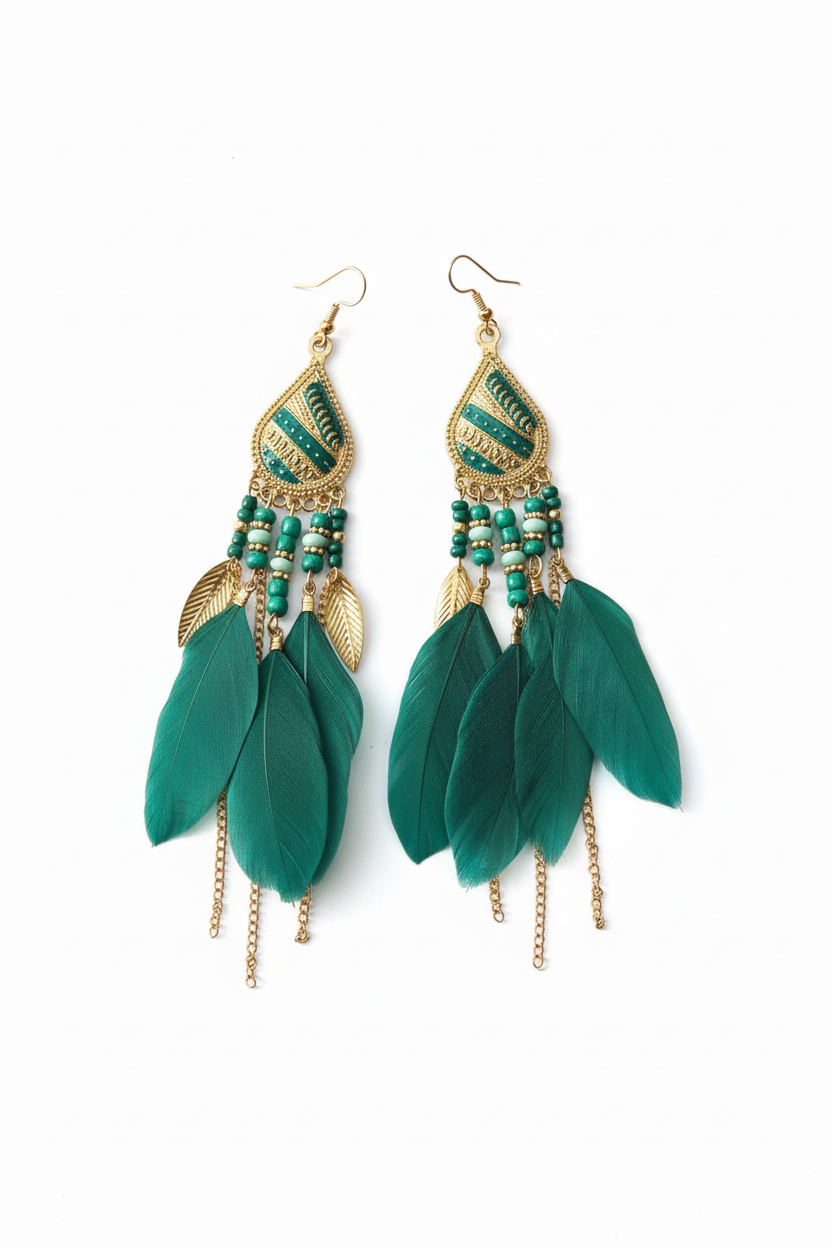 Emerald green feather drop earrings on white background