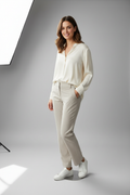 Model in Champagne Trousers - Casual Pose
