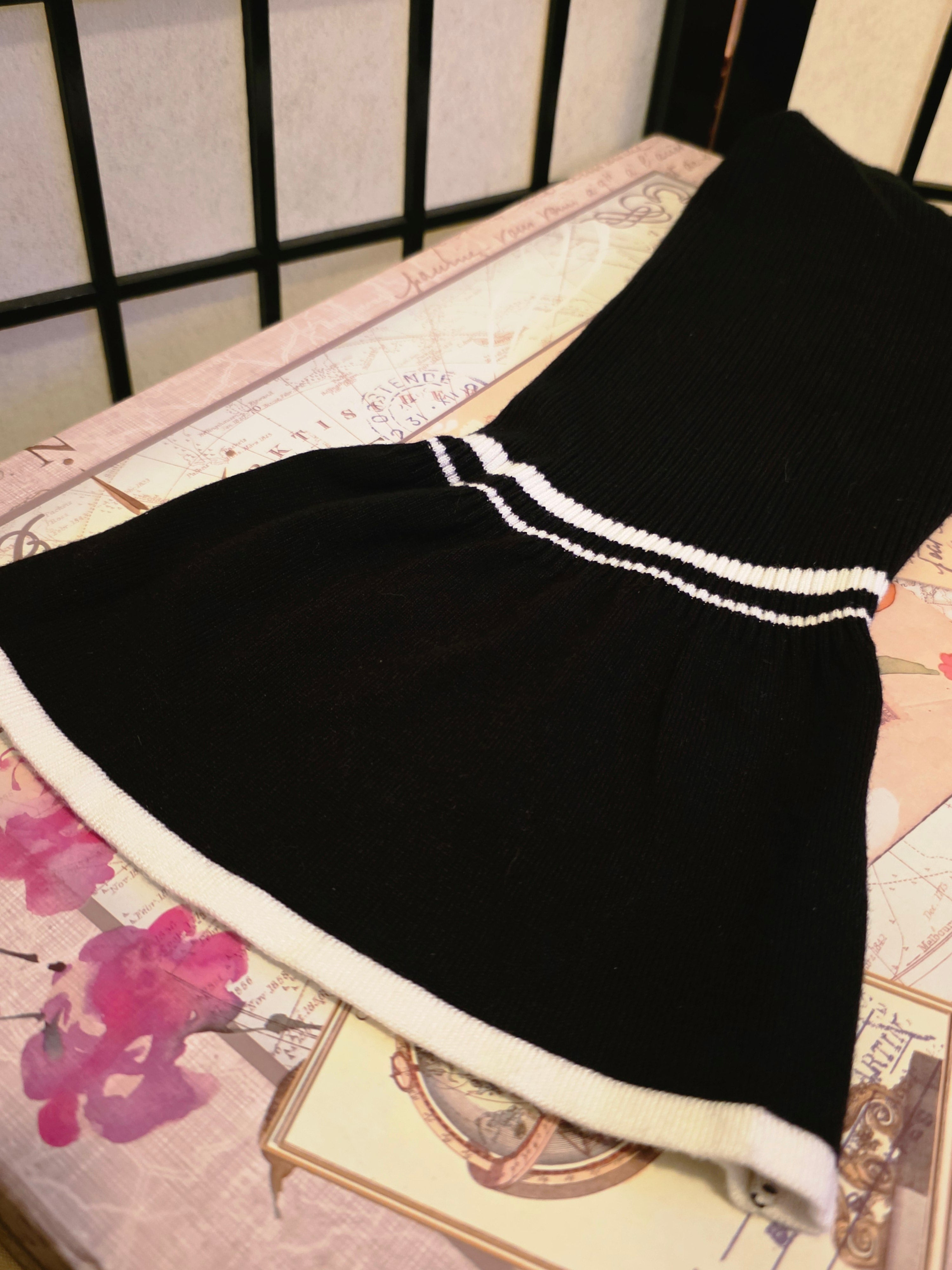 Classically Noir Striped Off-Shoulder Top