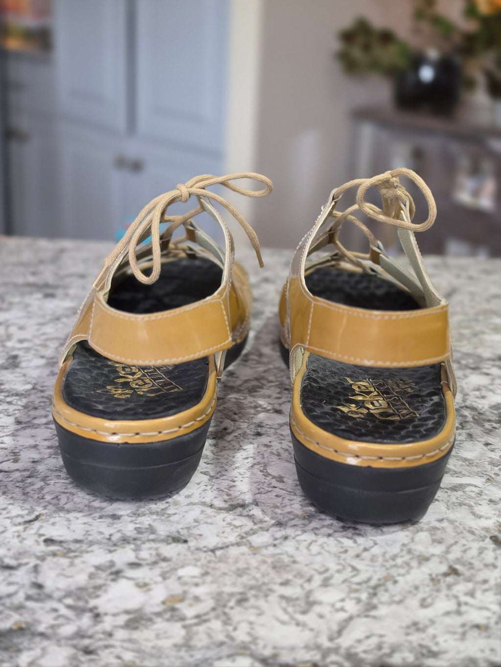 The Sunkissed Strapper — Rieker Anti-Stress Mustard Patent Lace-Up Sandals