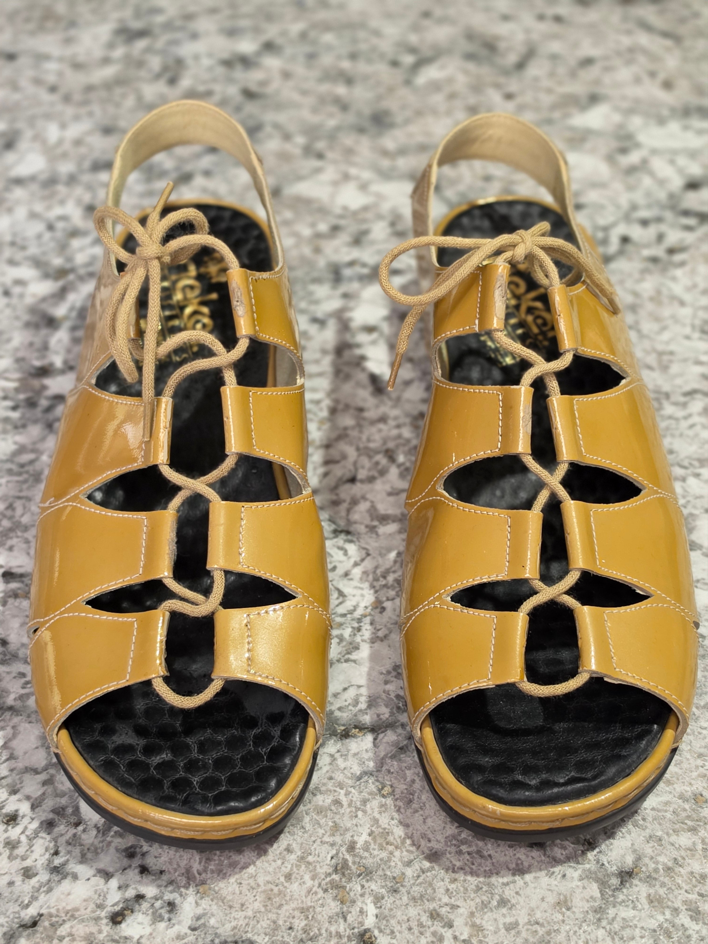 The Sunkissed Strapper — Rieker Anti-Stress Mustard Patent Lace-Up Sandals