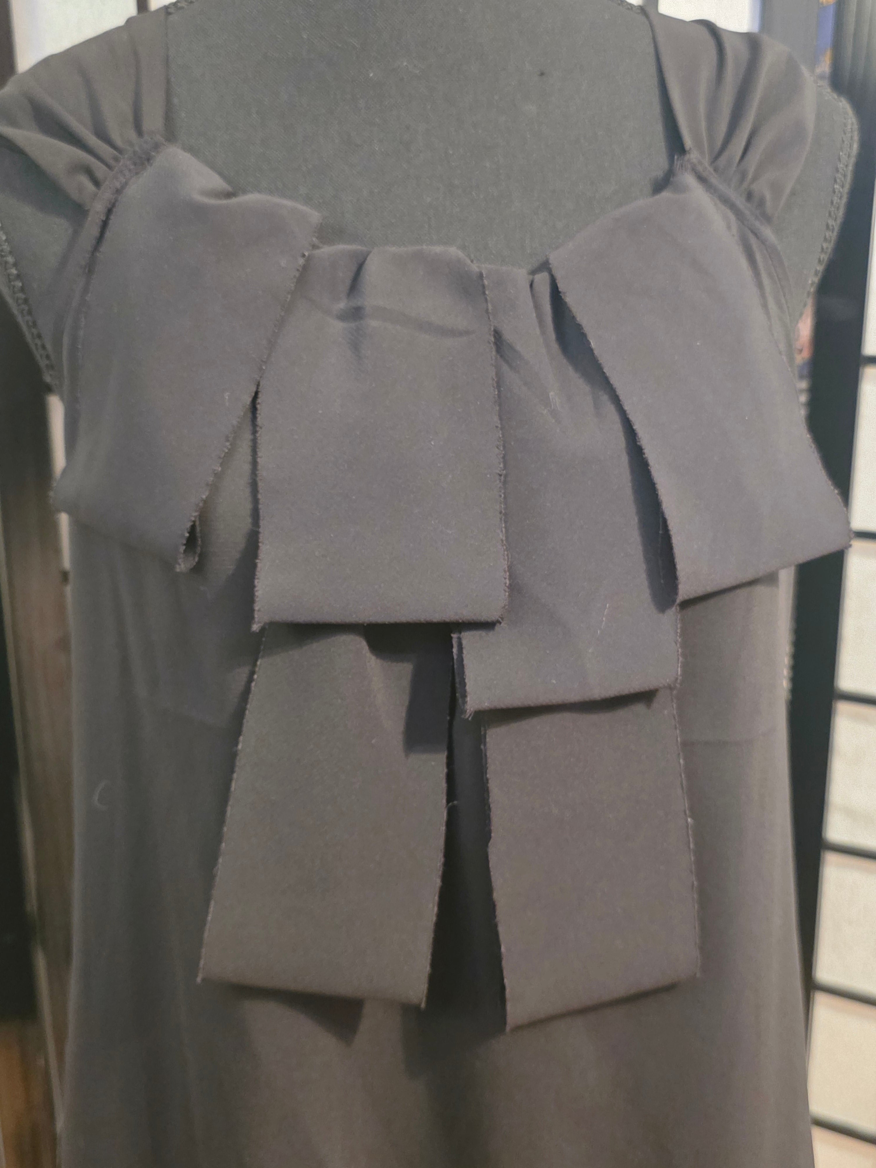 Elegantly Tailored Noir Bow Camisole
