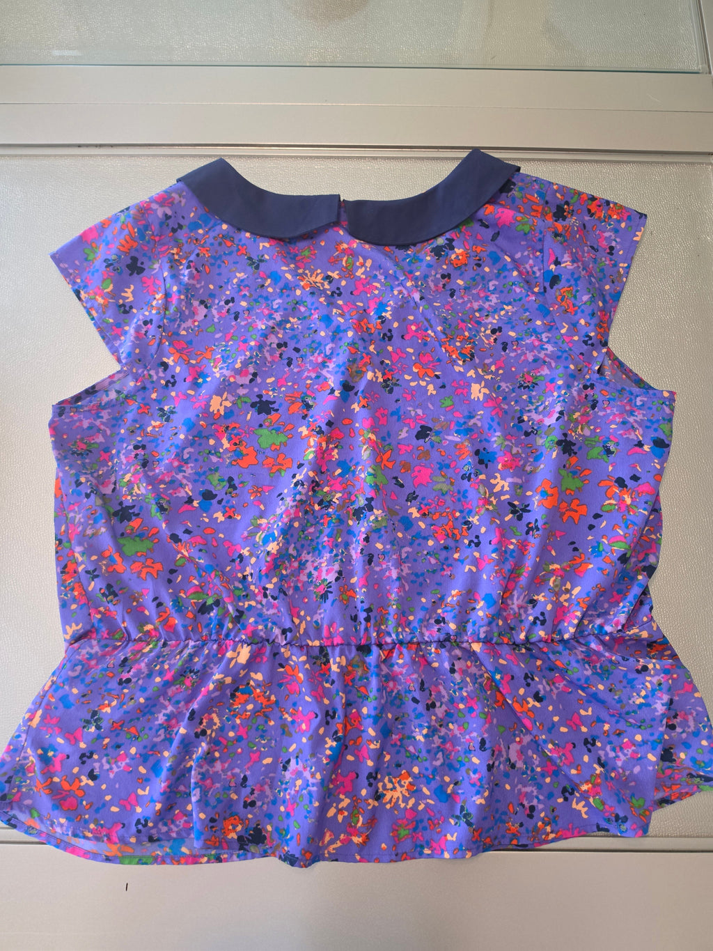 Jessica Simpson Peplum Blouse — Lavender Splatter Print | Junior Plus 2X