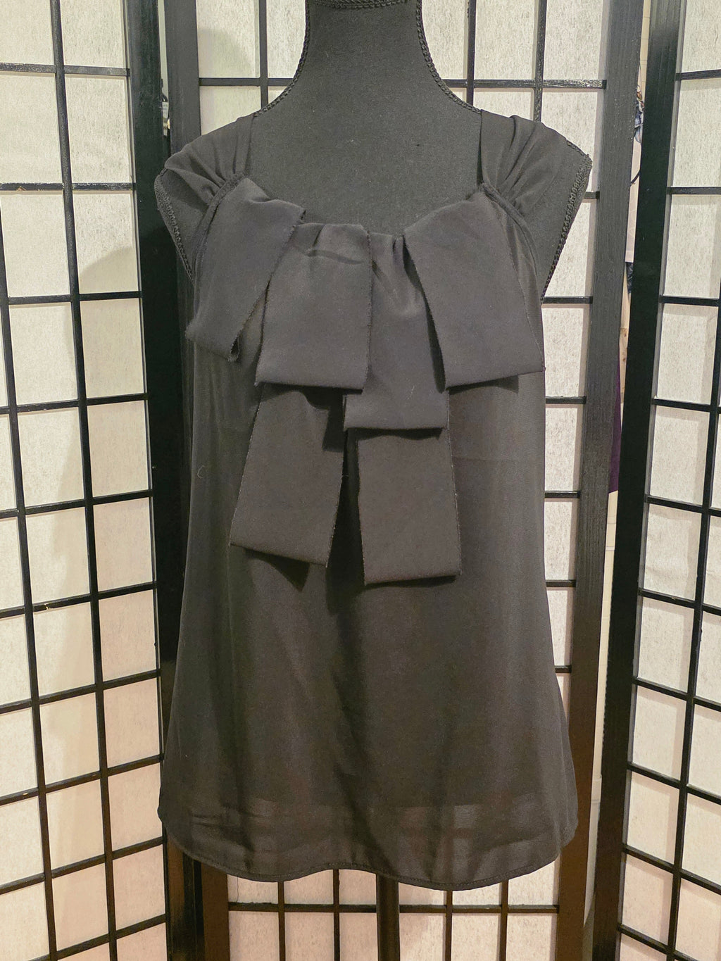 Elegantly Tailored Noir Bow Camisole