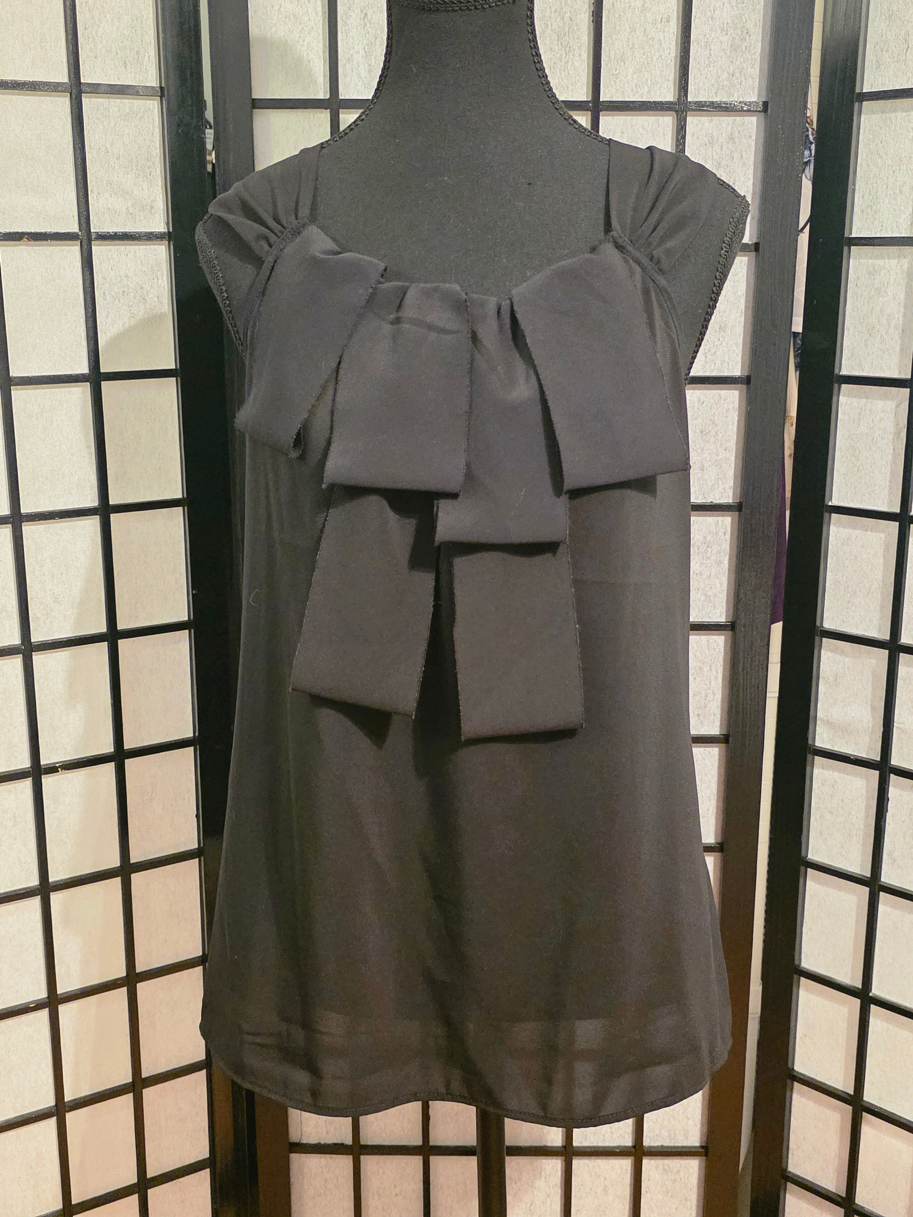 Elegantly Tailored Noir Bow Camisole